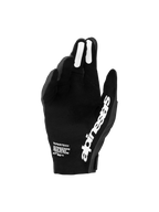 Alpinestars Supertech MX Gloves 2027, Men's Motocross Racing Gloves in Black and White, featuring a perforated palm for ventilation and silicone finger grips for precise lever control.