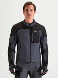 Alpinestars Arenis Gore-Tex Jacket, men's adventure touring motorcycle jacket in black and deep gray, front view on a model wearing matching gear and gloves, AA certified waterproof all-terrain riding apparel.