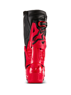 Alpinestars Tech 10 Enduro Boots, Bright Red and Black, rear view showcasing the Dynamic Heel Compression Protector and flexion frame, professional off-road motocross gear with a durable TPU shell and black leather upper panels