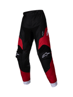 Alpinestars 2025 Kids Racer Veil Pants, Youth Motocross Pants, Black and Bright Red, white logos on thighs and knees, white ankle cuffs, pre-curved ergonomic design, durable material for off-road racing