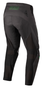 Alpinestars Techstar Phantom Pants, Motocross Pants, Anthracite and Green Neon, rear view featuring green neon 'ASTARS' branding on the waist, mesh ventilation panels on the back of the legs, and reinforced seat for durability in off-road racing