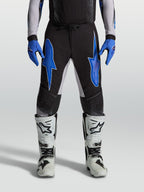 Alpinestars Supertech Hiten AFD Pants, black and blue men's motocross pants with lightweight stretch ripstop construction.