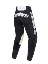 Alpinestars 2026 Racer Air Riway Pants, Motocross Pants, Black and White, back view featuring large white 'astars' branding across the seat and side, white back yoke, and off-white leather inner knee reinforcements for off-road performance.