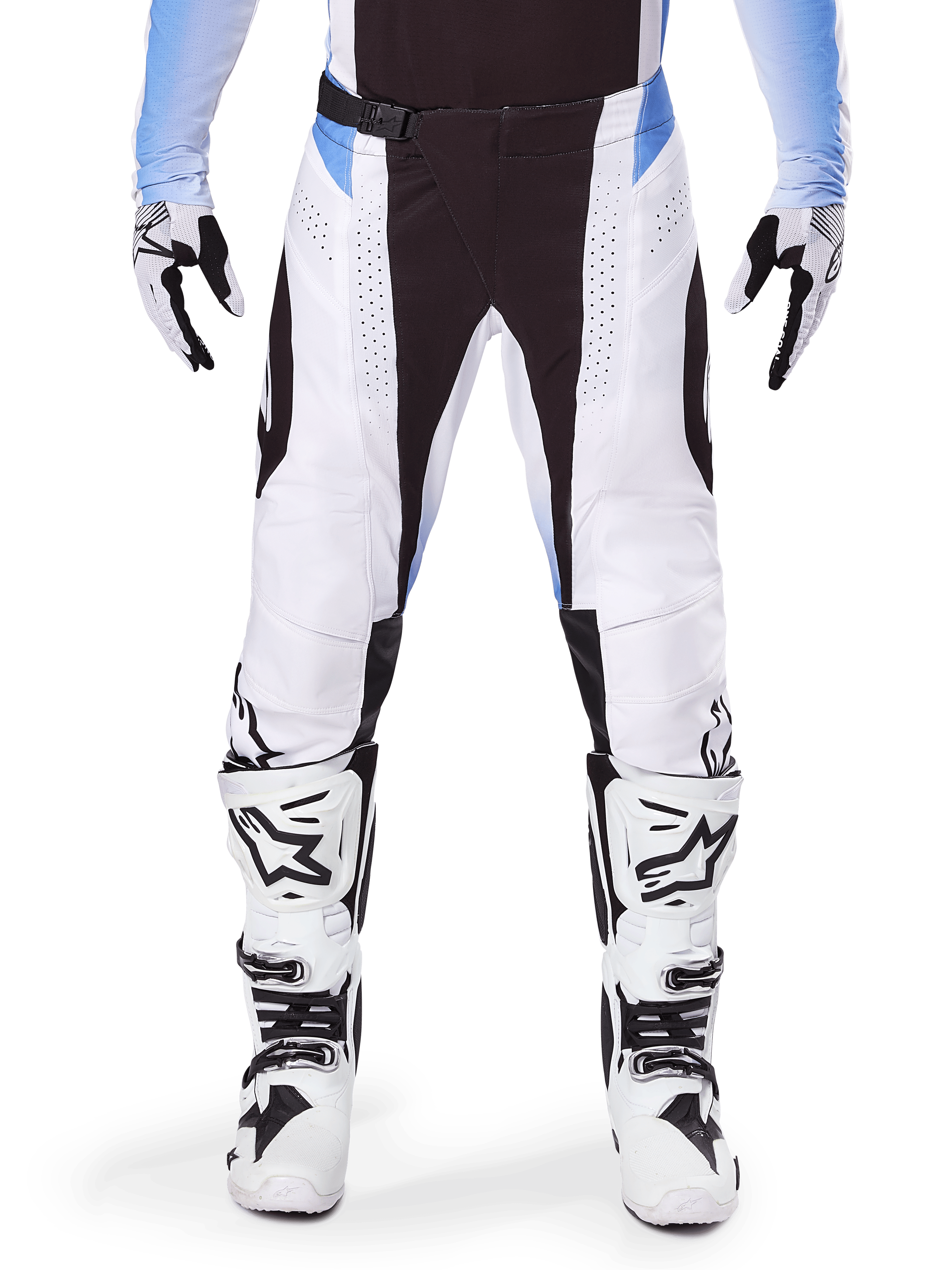 Alpinestars 2025 Techstar Melt Pants, Motocross Pants, White and Black with Light Blue accents, worn with matching white and black boots and gloves, featuring laser-cut perforations and high-performance racing design.