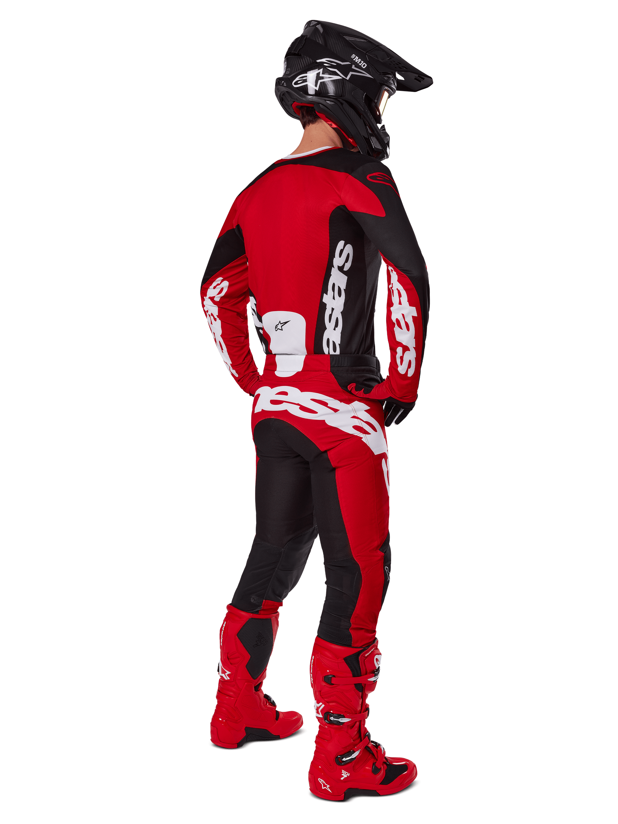Alpinestars 2025 Racer Veil Pants, Motocross Pants, Black and Bright Red, shown from the back on a rider wearing a matching jersey, red boots, and a black helmet, featuring bold white Alpinestars branding and a performance-driven off-road design