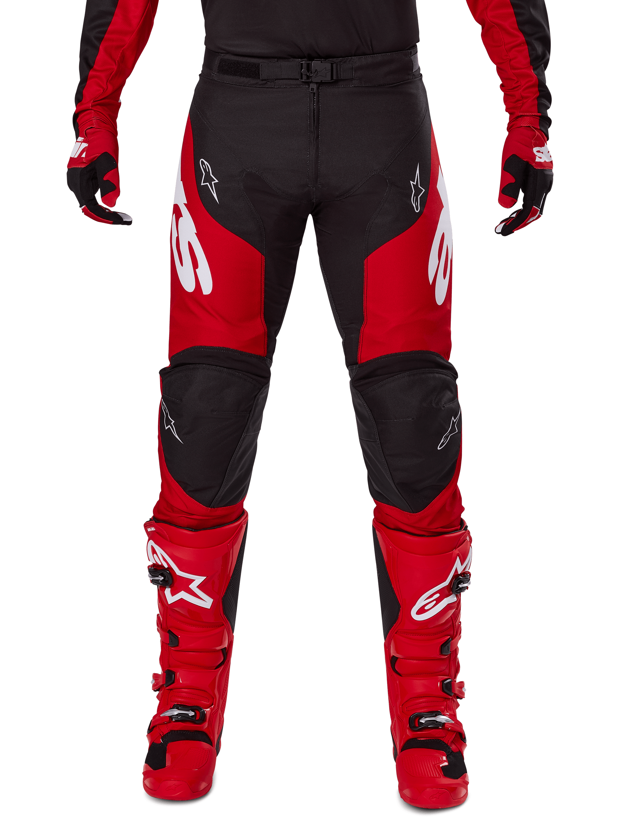 Alpinestars 2025 Racer Veil Pants, Motocross Pants, Black and Bright Red, worn with matching red gloves and boots, featuring large white Alpinestars logos on the thighs, black knee panels, and an adjustable waist buckle for off-road riding