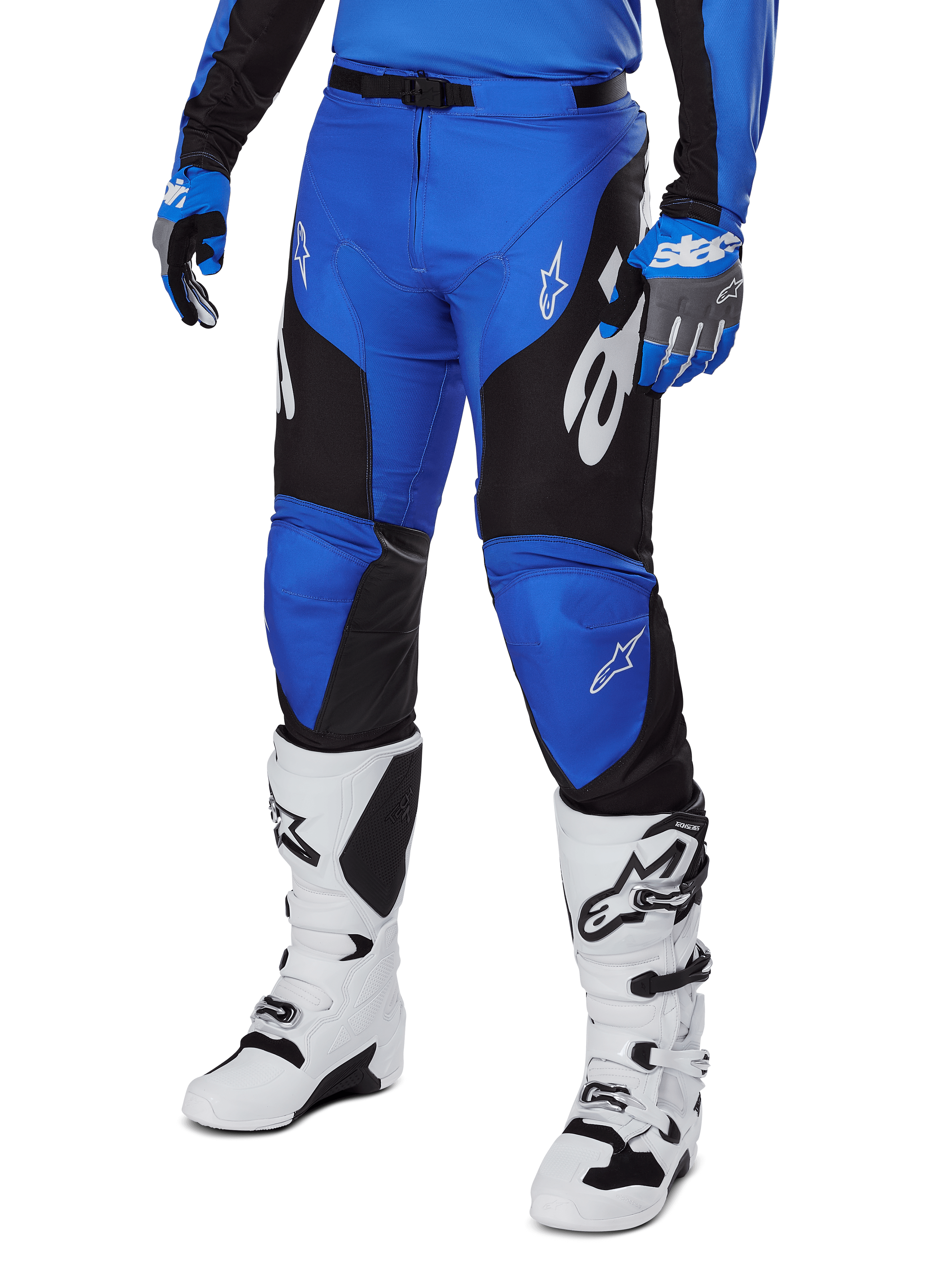 Alpinestars 2025 Racer Veil Pants, Motocross Pants, Blue and Black, with white graphic accents, worn with matching blue jersey, gloves, and white boots, durable protection gear for off-road racing