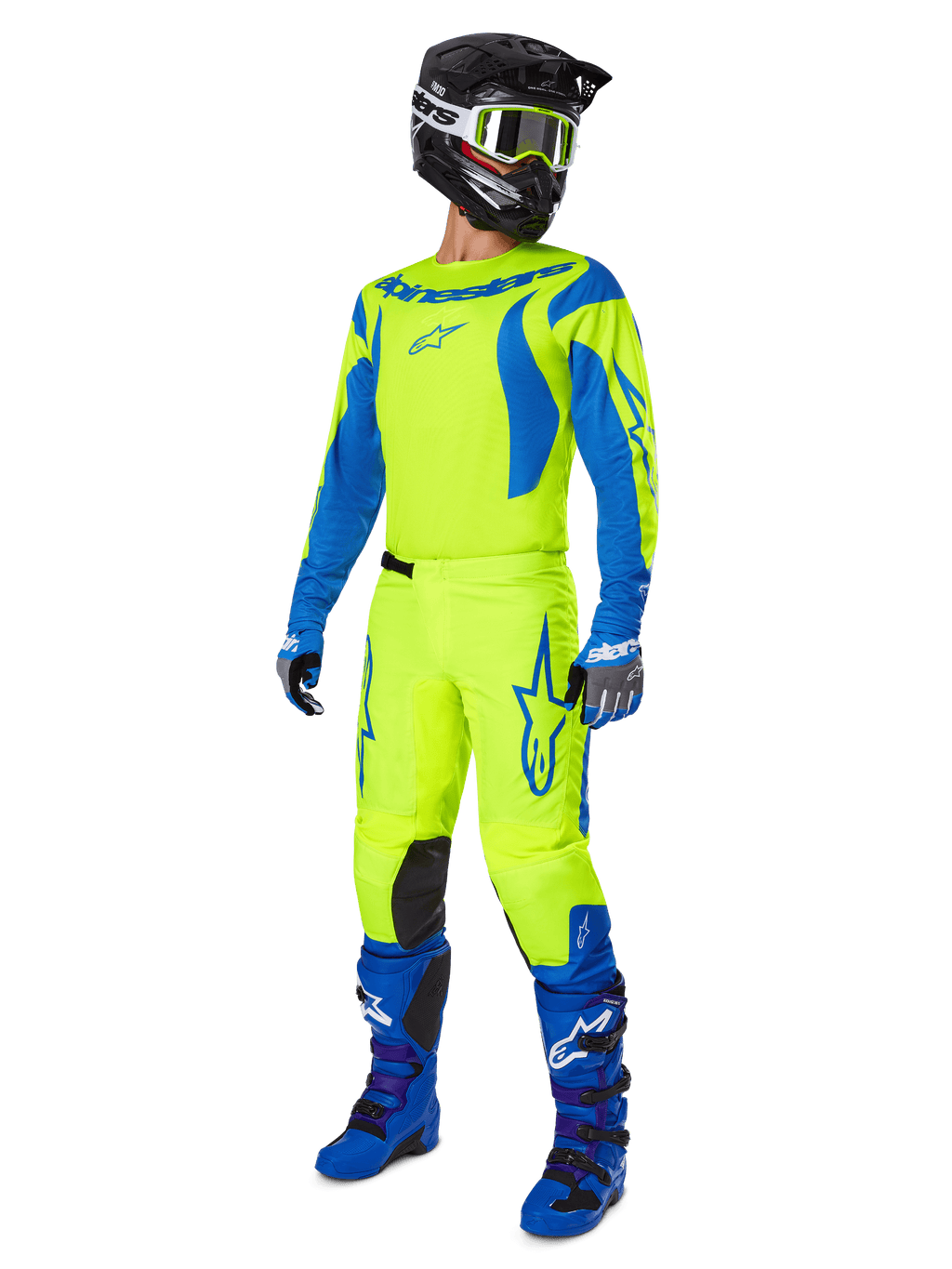 Alpinestars 2025 Fluid Haul Pants, Motocross Pants, Bright Yellow Fluo and Blue, worn as part of a complete racing gear set with matching jersey, blue boots, and a black helmet, high-visibility design for off-road riding.