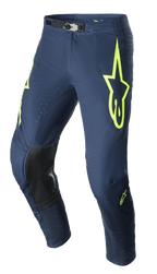 Alpinestars 2023 Supertech Bruin Pants, Motocross Pants, Night Navy and Yellow Fluo, featuring black reinforced knee panels, perforated ventilation, and adjustable magnetic waist buckle, durable racing design