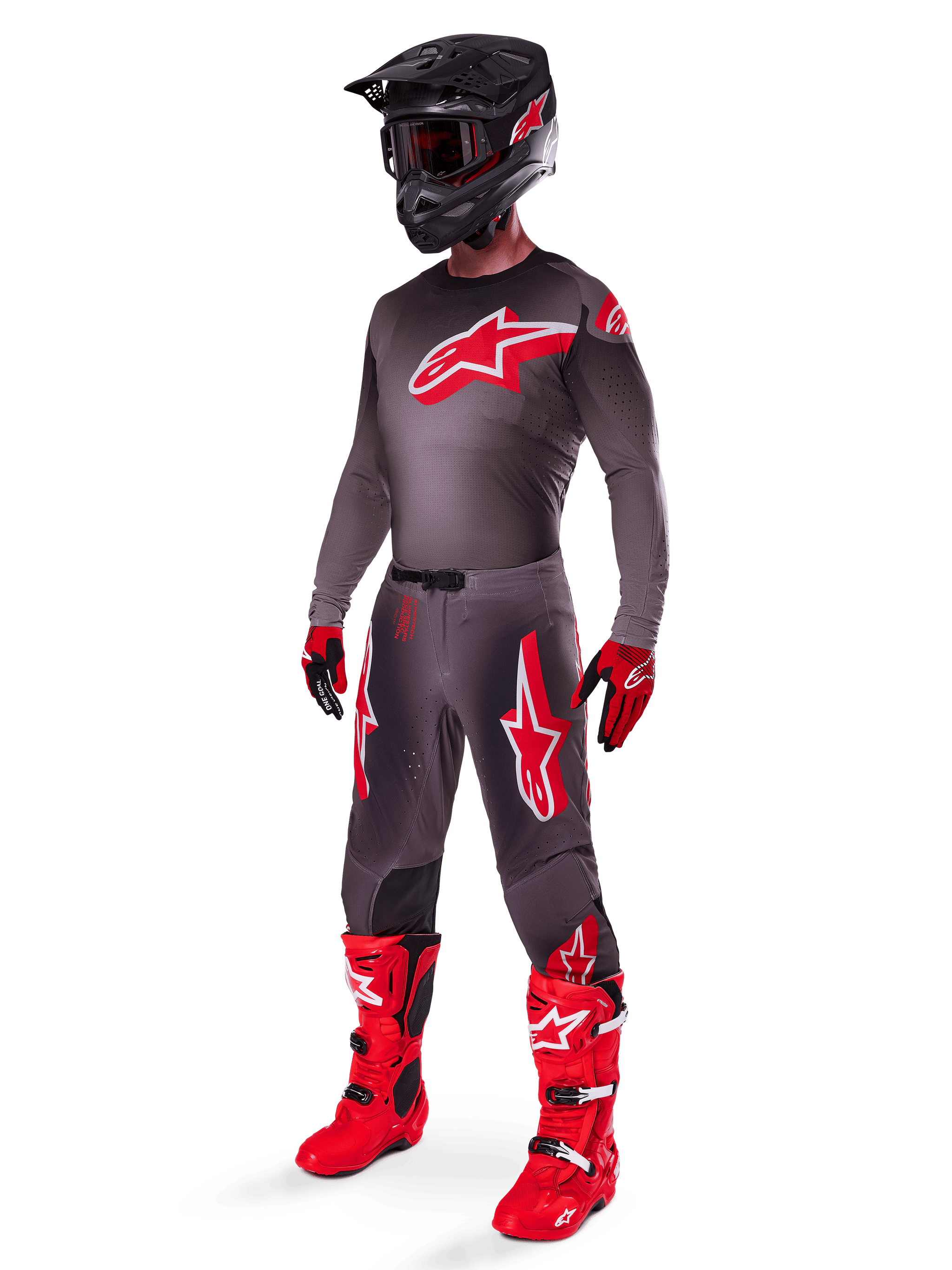 Alpinestars 2025 Supertech Lipan Pants, Motocross Pants, Smoke Bright Red, dark grey base with large red Alpinestars logos on the thighs, worn with matching jersey, black helmet, red and black gloves, and bright red boots, coordinated pro-level motocross outfit