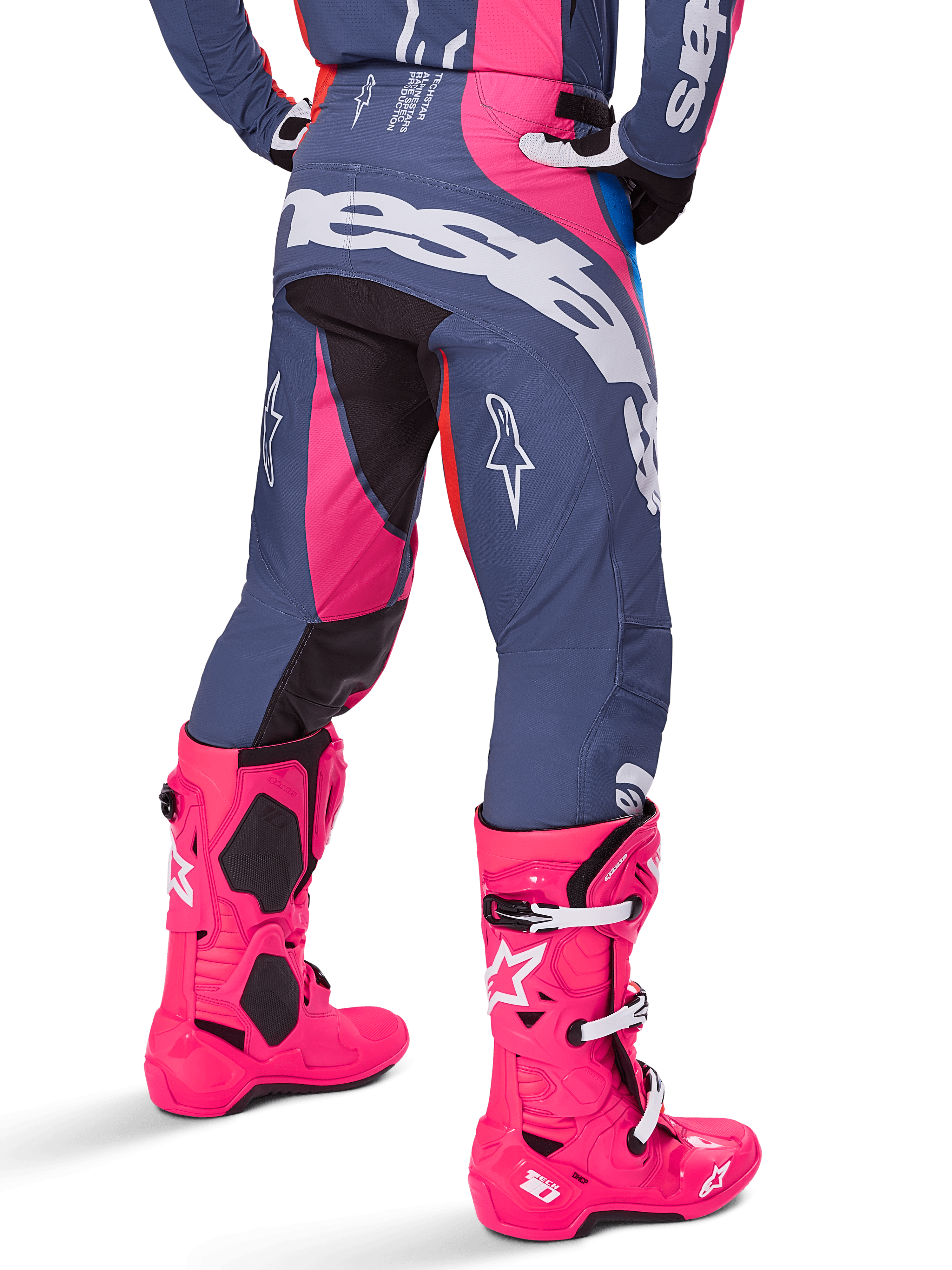 Alpinestars 2025 Techstar Dreem Pants, Motocross Pants, Gray and Pink Multicolor, rear view featuring large white Alpinestars branding across the seat, worn with matching bright pink Tech 10 boots, durable off-road racing gear with reinforced panels.