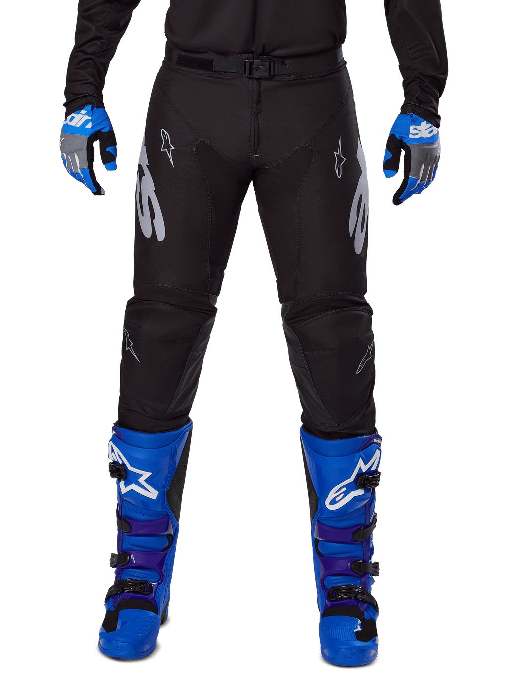 Alpinestars 2025 Racer Graphite Pants, Motocross Pants, Black and Gray, worn with blue and gray gloves and blue boots, featuring silver Astars branding on the thighs and reinforced knees, sporty design for off-road performance
