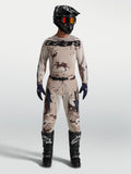 Alpinestars Men's Racer Lone Gear Set, tan desert camo motocross jersey and pants on model with black helmet and boots.