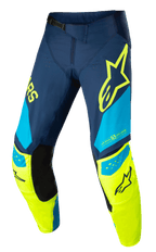 Alpinestars Techstar Factory Pants, Motocross Racing Pants, Dark Blue, Yellow Fluo and Light Blue, featuring black inner knee panels, yellow star logo on the thigh, "ONE GOAL ONE VISION" branding, and perforated ventilation zones for performance off-road gear