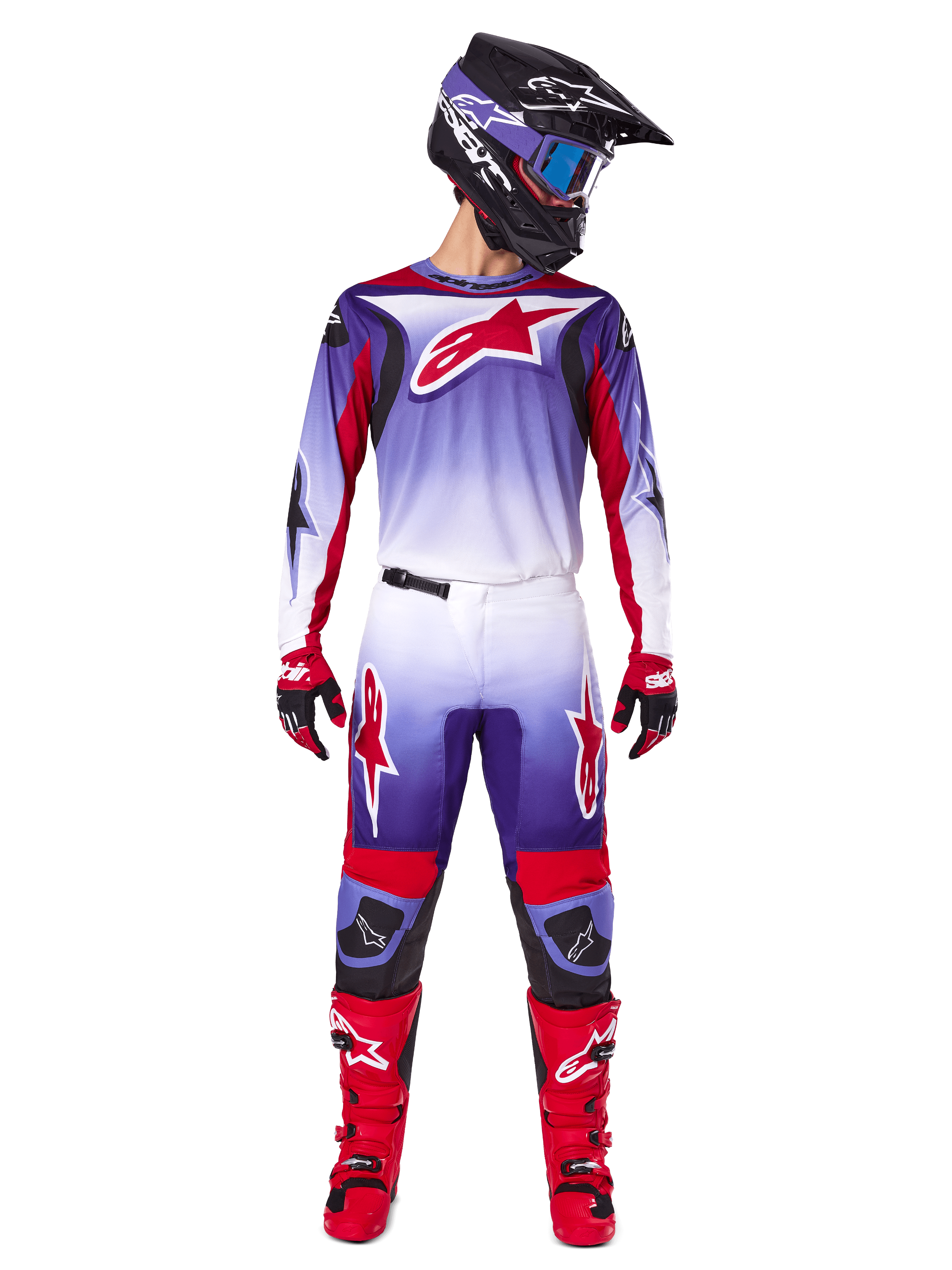 Alpinestars 2025 Fluid Wurx Gear Set, Motocross rider in purple, white, and bright red jersey and pants, black helmet with blue goggles, red motocross boots and matching gloves, athletic racing design for off-road performance
