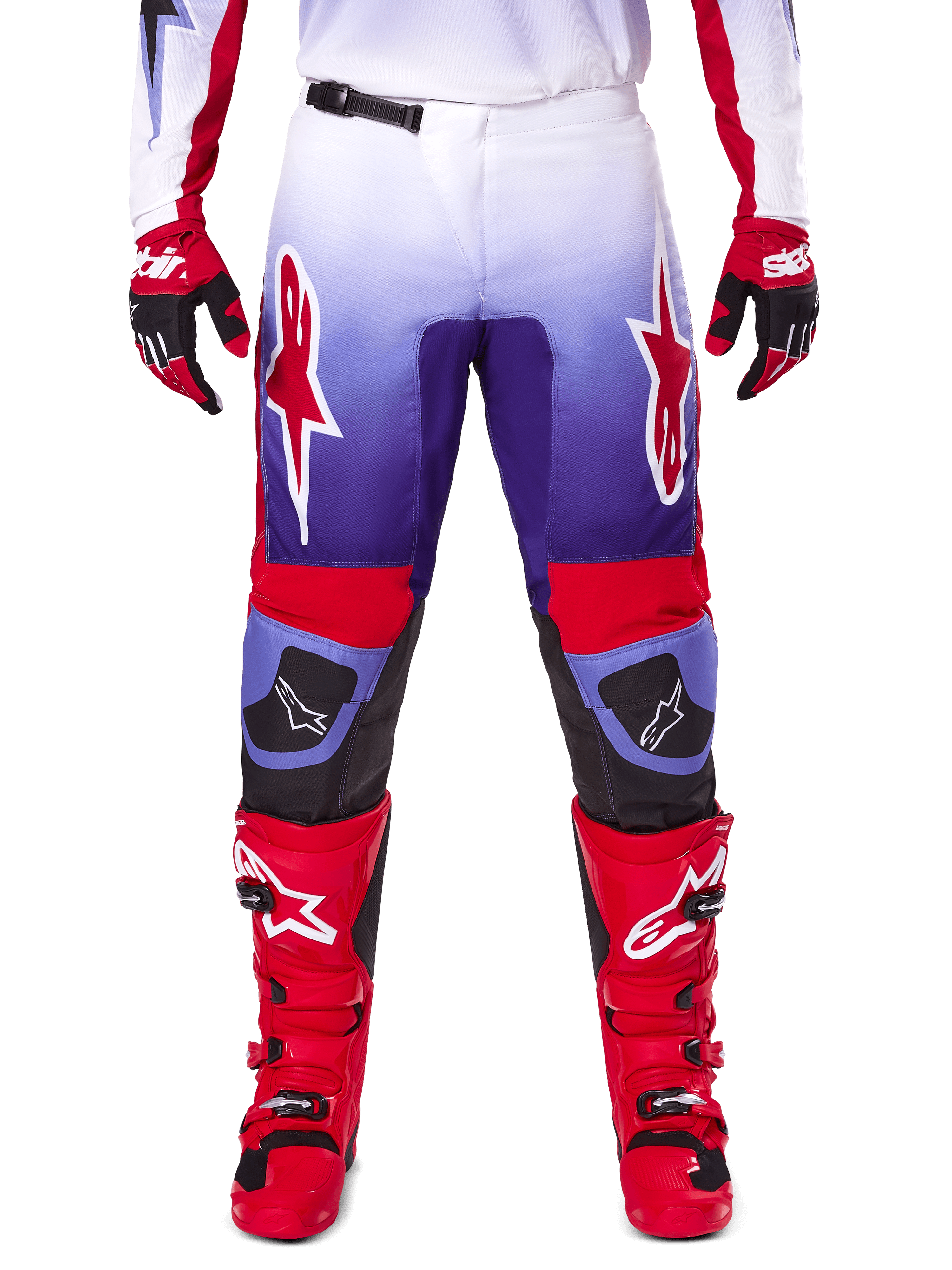 Alpinestars 2025 Fluid Wurx Pants, Motocross Pants, Purple and Bright Red, worn with matching red boots and gloves, featuring white logos on the thighs and black knee reinforcements, performance gear for off-road riding