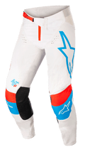 Alpinestars Techstar Quadro Pants, Motocross Pants, Off White with Blue and Neon Bright Red accents, featuring large blue star logo on left leg, AST 63 logo on right leg, black inner knee patches, red waist buckle, and perforated ventilation zones for off-road performance