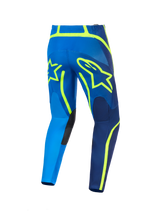 Alpinestars 2026 Fluid Apex Pants, Motocross Pants, Blue and Yellow Fluo, rear view featuring large yellow star logo outlines, reinforced inner knee panels, and durable polyfabric construction for off-road racing