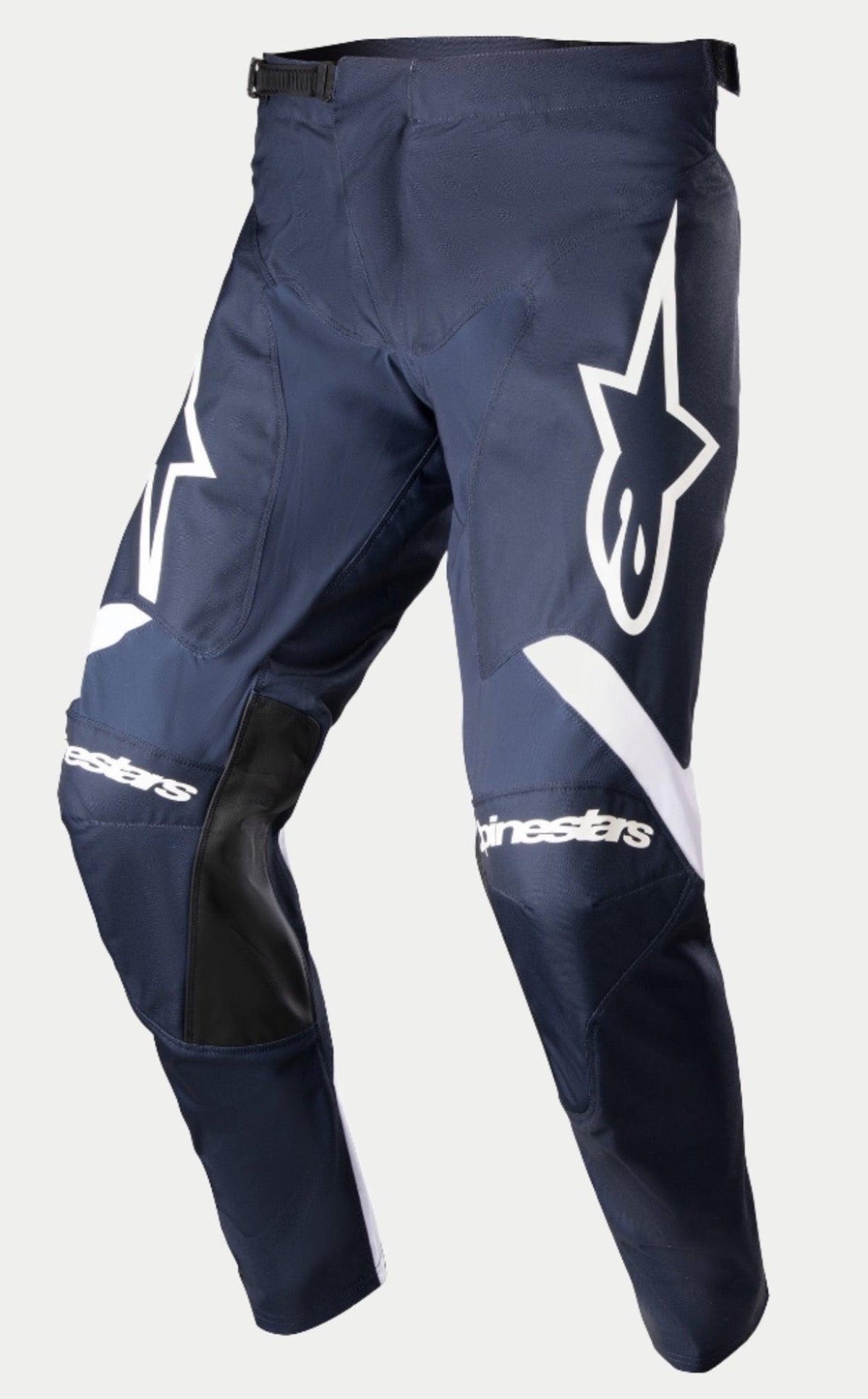 Alpinestars 2023 Racer Hoen Pants, Motocross Pants, Night Navy and White, featuring large white Alpinestars logos on the thighs, white branding on knees, black leather inner leg panels, and ergonomic pre-curved design for off-road riding