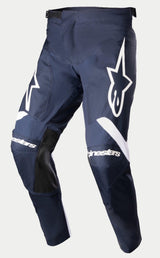 Alpinestars 2023 Racer Hoen Pants, Motocross Pants, Night Navy and White, featuring large white Alpinestars logos on the thighs, white branding on knees, black leather inner leg panels, and ergonomic pre-curved design for off-road riding