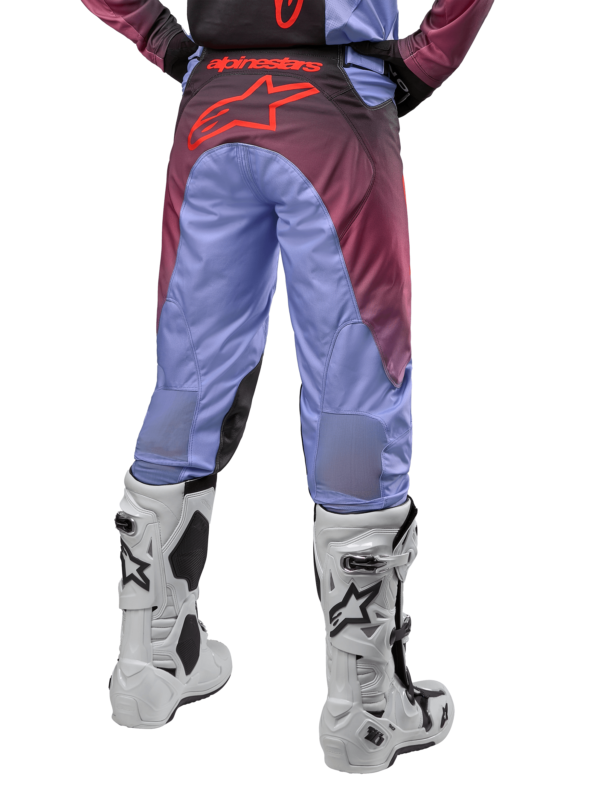 Alpinestars 2024 Racer Hoen Pants, Motocross Pants, Lavan Purple and Black, back view showing a large red star logo on the seat, worn with white motocross boots, featuring breathable stretch panels on the lower legs.