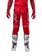 Alpinestars 2024 Racer Hoen Pants, Motocross Pants, Mars Red Burgundy, front view featuring silver Alpinestars logos and knee branding, worn with matching red jersey, red and black gloves, and white off-road boots