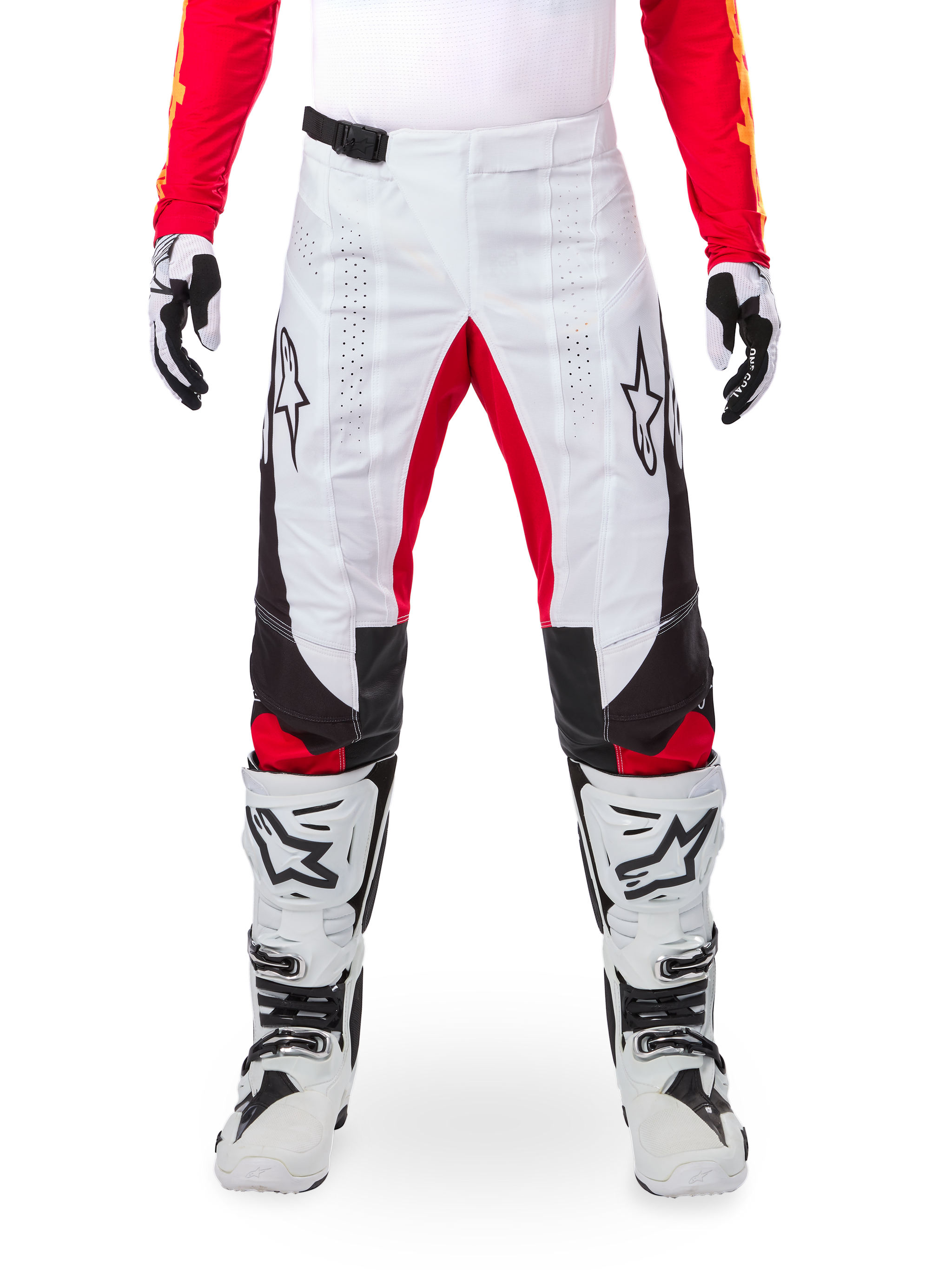 Alpinestars Limited Edition Techstar Deep Pants, Motocross Pants, Black White and High Red, worn with matching red jersey, white and black gloves and boots, featuring white front panels, red inner leg accents, black side panels, Alpinestars logos on thighs, and laser-perforated details for ventilation.