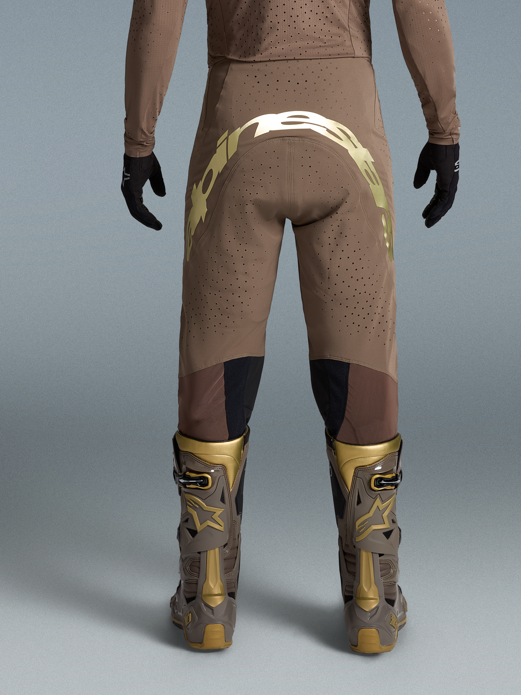 Alpinestars Supertech Air Gold Motocross Pants, brown and gold, athletic fit racing trousers with perforated stretch fabric.