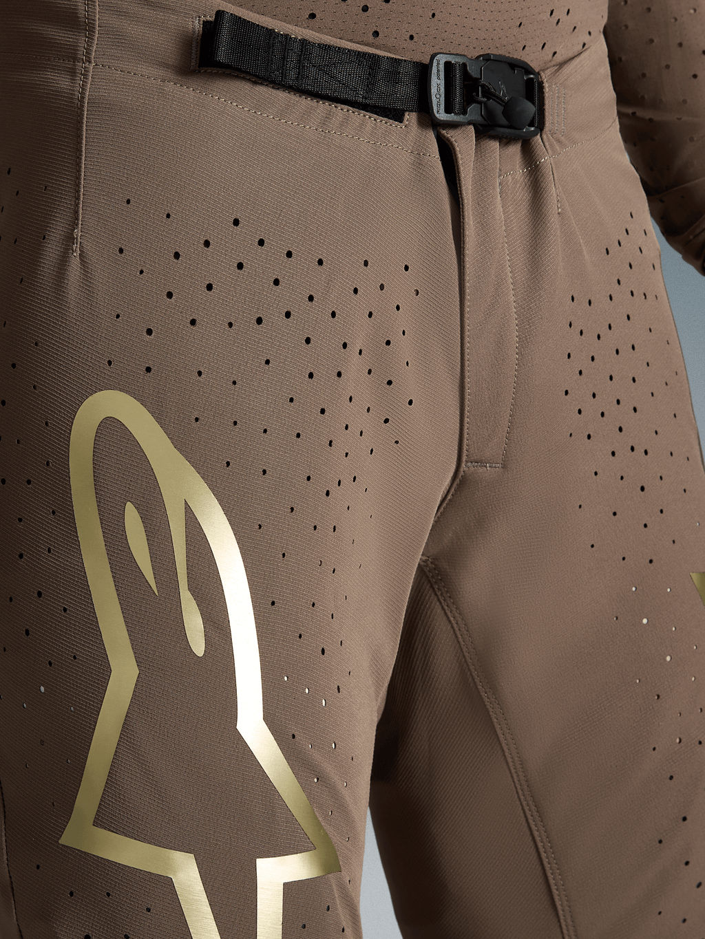 Alpinestars Limited Edition Supertech Air Gold Motocross Pants in Brown with gold logo and SX1 magnetic buckle.