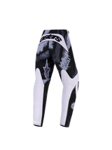 Alpinestars 2026 Youth Fluid Lahnd Pants, Motocross Pants, Iron Camo, back view featuring a black and white abstract pattern, white inner leg panels, and bold 'astars' branding on the back yoke, durable off-road gear for young riders