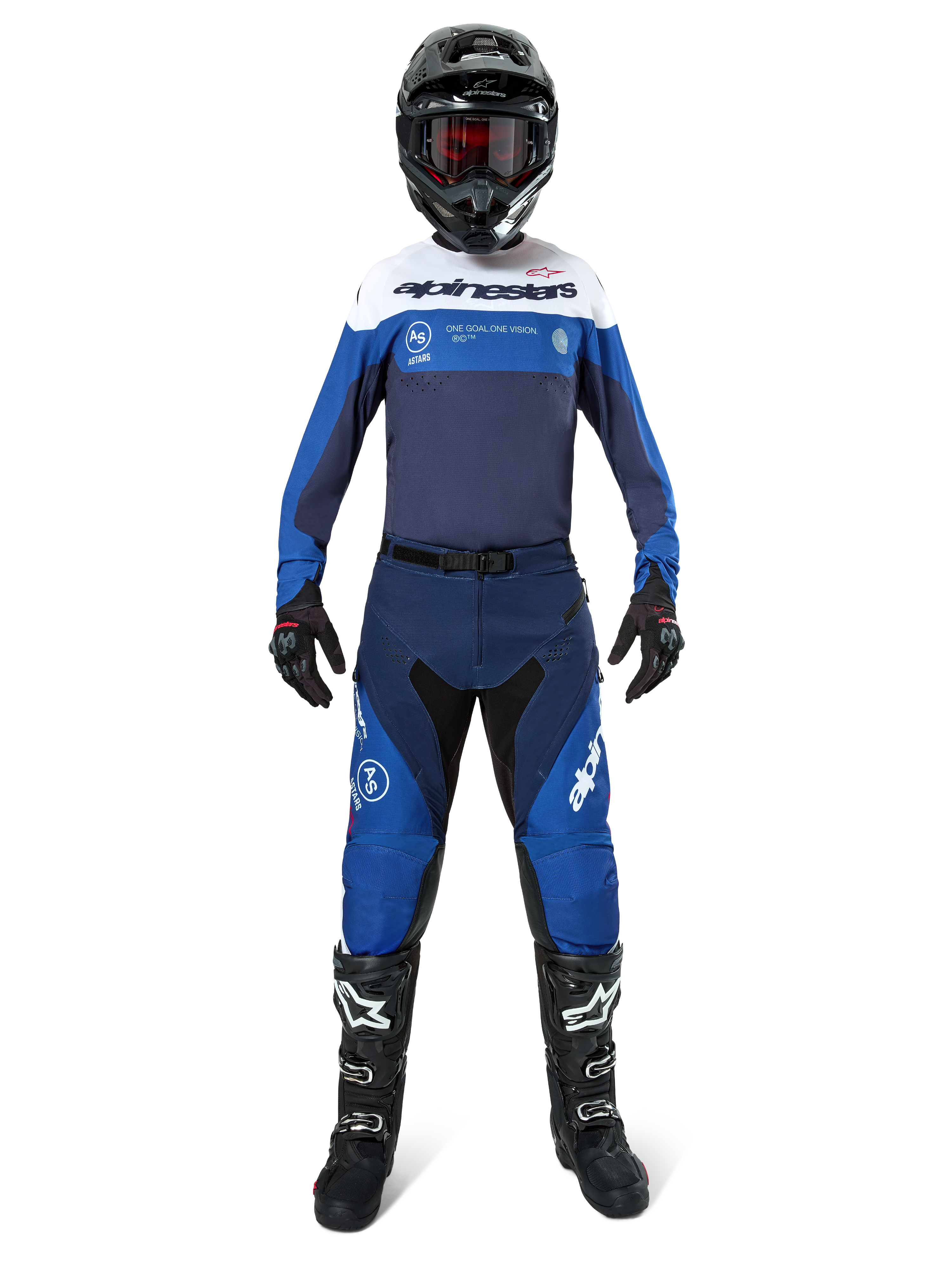 Motocross rider wearing complete racing gear, Pro-Dura Jersey in Navy, Bright Blue and White, matching blue and navy pants, black helmet with red goggles, black and white boots, coordinated outfit for enduro and off-road riding