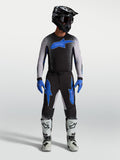Alpinestars Supertech Hiten AFD Jersey and Gear Set, black and blue men's motocross racing apparel with ergonomic fit.