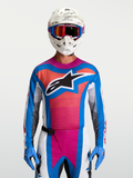 Alpinestars Techstar Maven Jersey, blue and coral motocross gear, athletic race fit with moisture-wicking stretch fabric.