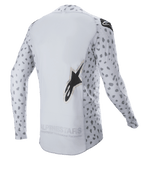 Alpinestars 2023 Supertech North Jersey, Motocross Jersey, Haze Gray and Black, back view featuring an abstract spotted pattern on sleeves and sides, large star logo, extended back panel, and breathable performance construction