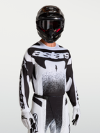 Alpinestars Techstar Swan Jersey, men's black and white motocross jersey with athletic fit and laser-cut ventilation.