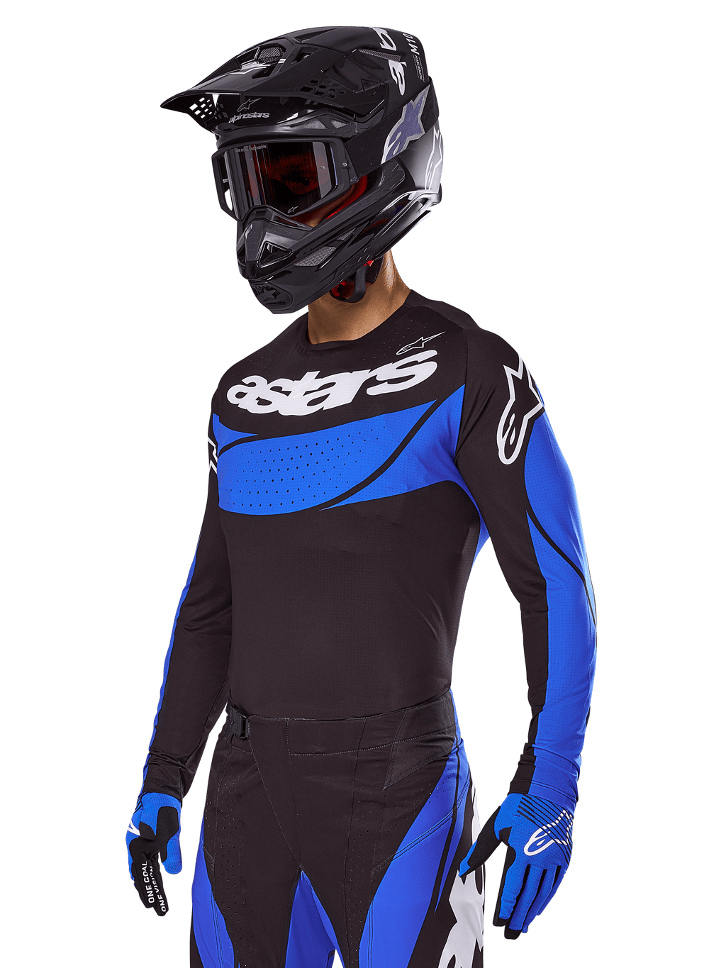 Motocross rider wearing the Alpinestars 2025 Techstar Dreem Gear Set, Black jersey with blue perforated-style panels and white branding, matching black and blue pants, black racing helmet, and blue gloves, coordinated performance outfit for off-road motocross.