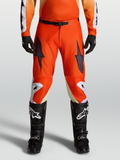 Alpinestars Racer Amber Motocross Pants in Cardinal Red, on-model view with durable 600D polyfabric and pre-curved fit.