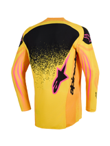 Alpinestars 2026 Techstar Nomur Jersey, Motocross Jersey, Orange Yellow and Pink, rear view featuring a black upper back panel with a speckled gradient, pink logo accents, and wavy graphic patterns on the sleeves.