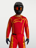 Alpinestars Fluid Apex V2 Jersey, Men's Motocross Jersey in Fire Red and Gold, featuring lightweight moisture-wicking fabric.
