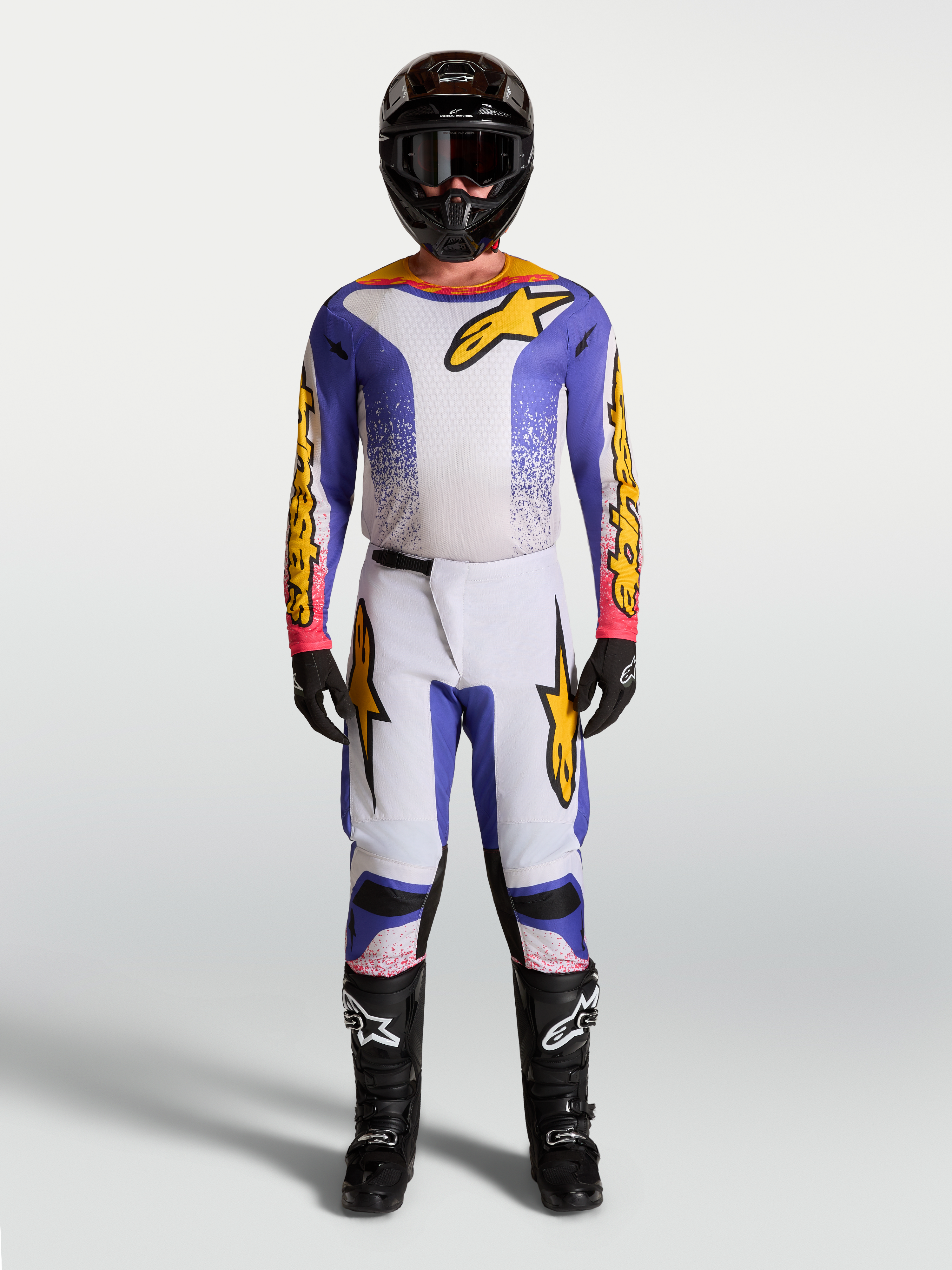 Alpinestars Fluid Drag Jersey and Gear Set, men's motocross outfit in blue and gold with ergonomic stretch textile.