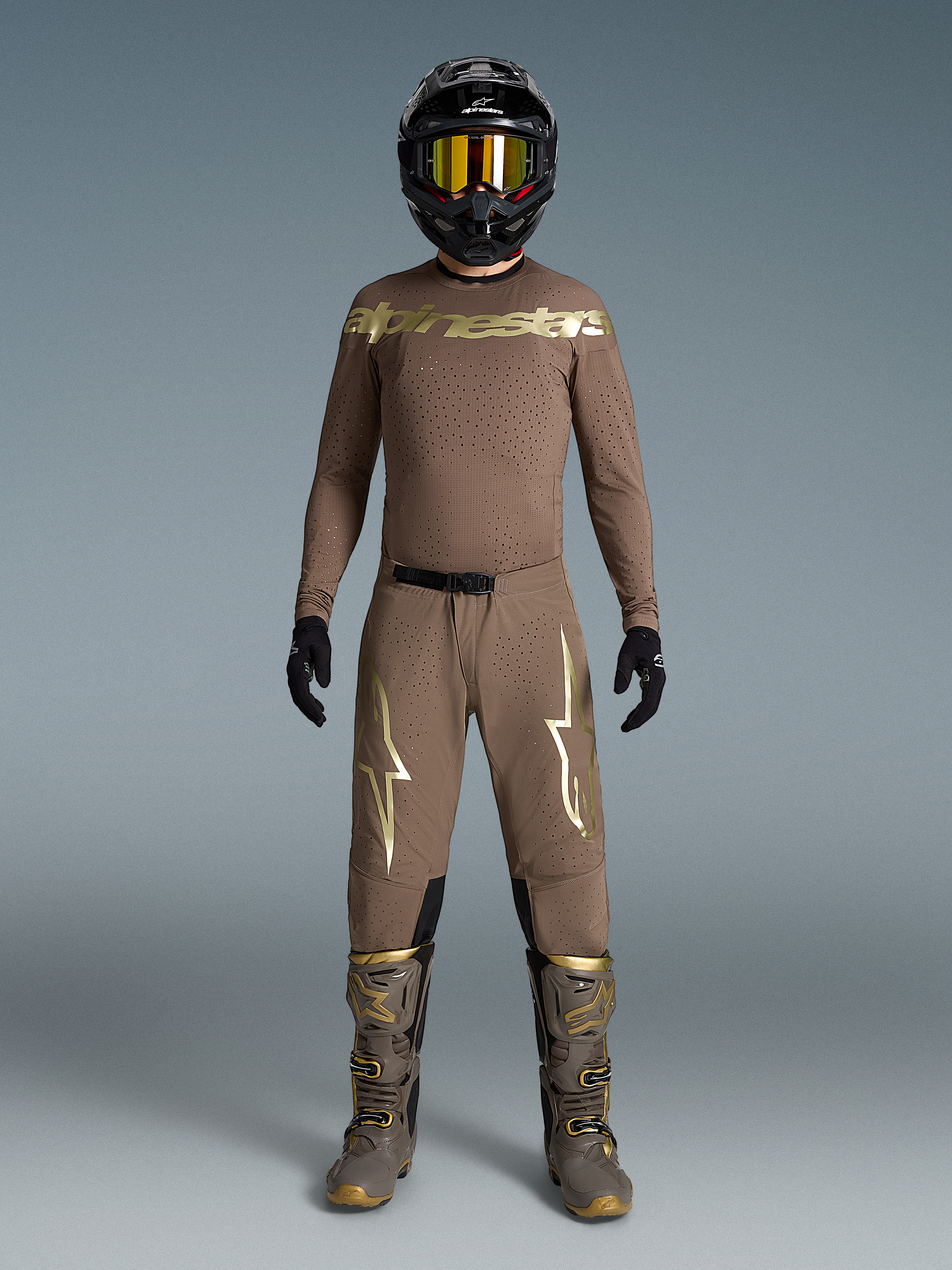 Alpinestars Limited Edition Supertech Air Gold Gear Set, Earth Brown and Gold ventilated motocross kit with helmet and boots.