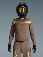 Alpinestars Limited Edition Supertech Air Gold Jersey, brown and gold motocross gear with laser-cut ventilation.