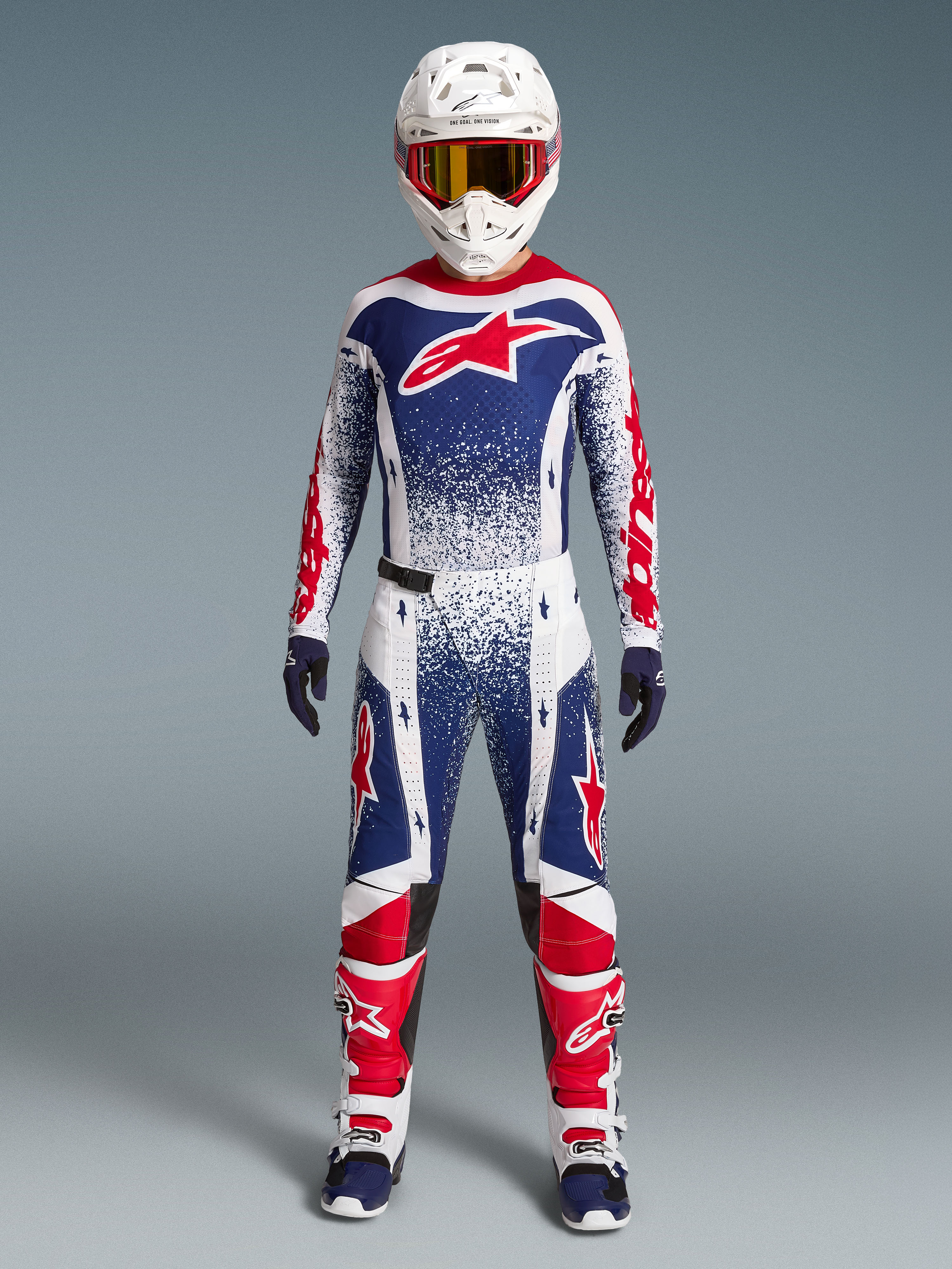 Alpinestars Limited Edition Techstar Unity Motocross Gear Set, red, white, and blue racing kit with star graphics.