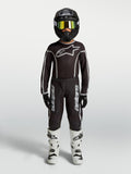 Alpinestars Youth Fluid Apex V2 Jersey and Gear Set, black and silver motocross outfit with white boots.