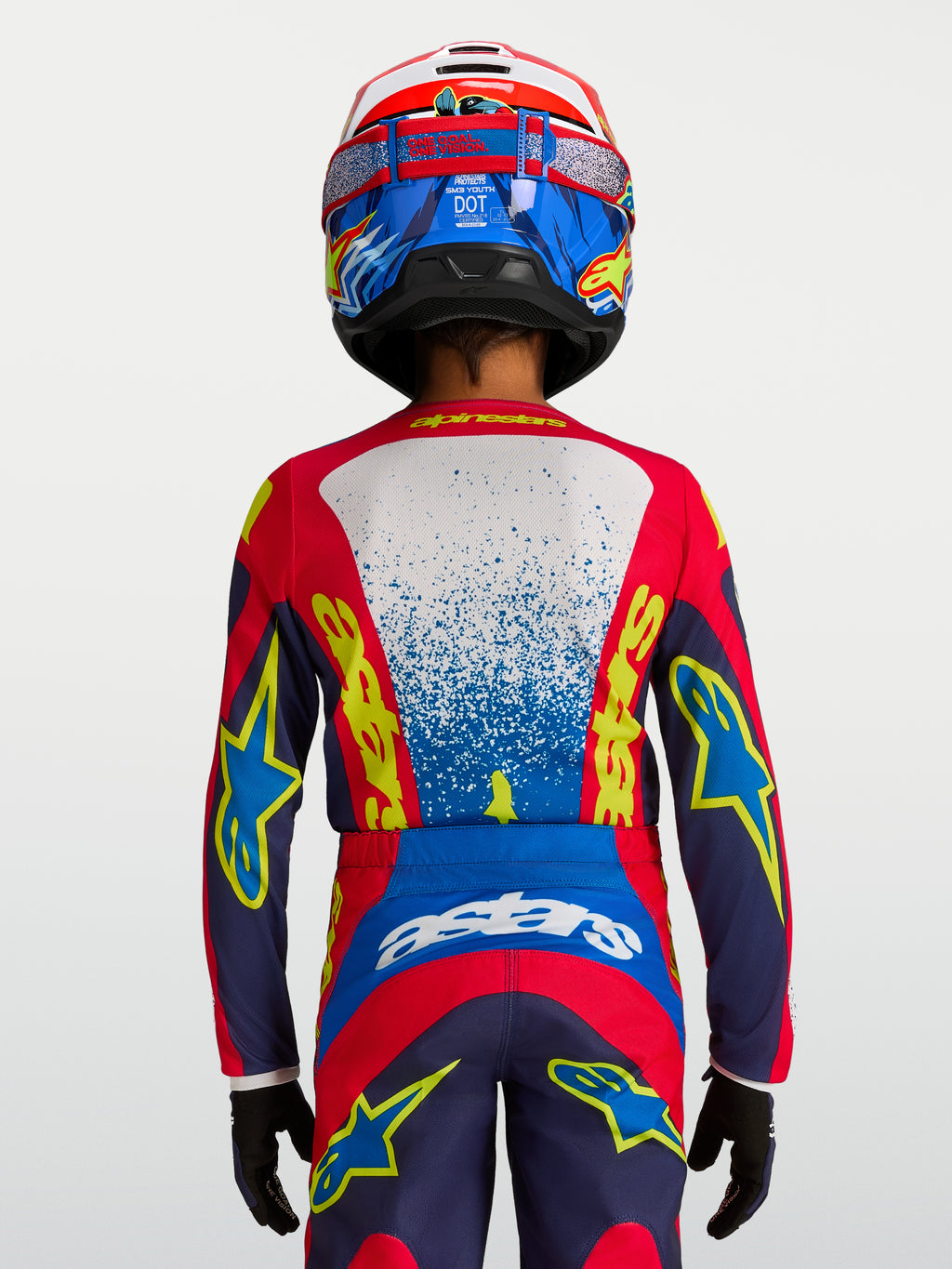 Alpinestars Youth Fluid Drag Jersey in Blue and Red, technical motocross racing top with ergonomic fit for young riders.