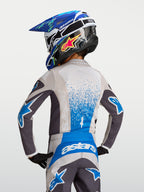 Alpinestars Youth Fluid Drag Jersey, gray and blue motocross racing gear for kids, moisture-wicking performance fabric.