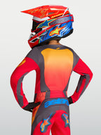 Alpinestars Youth Fluid Hunt Jersey in red and gray, moisture-wicking youth motocross jersey with a relaxed athletic fit.