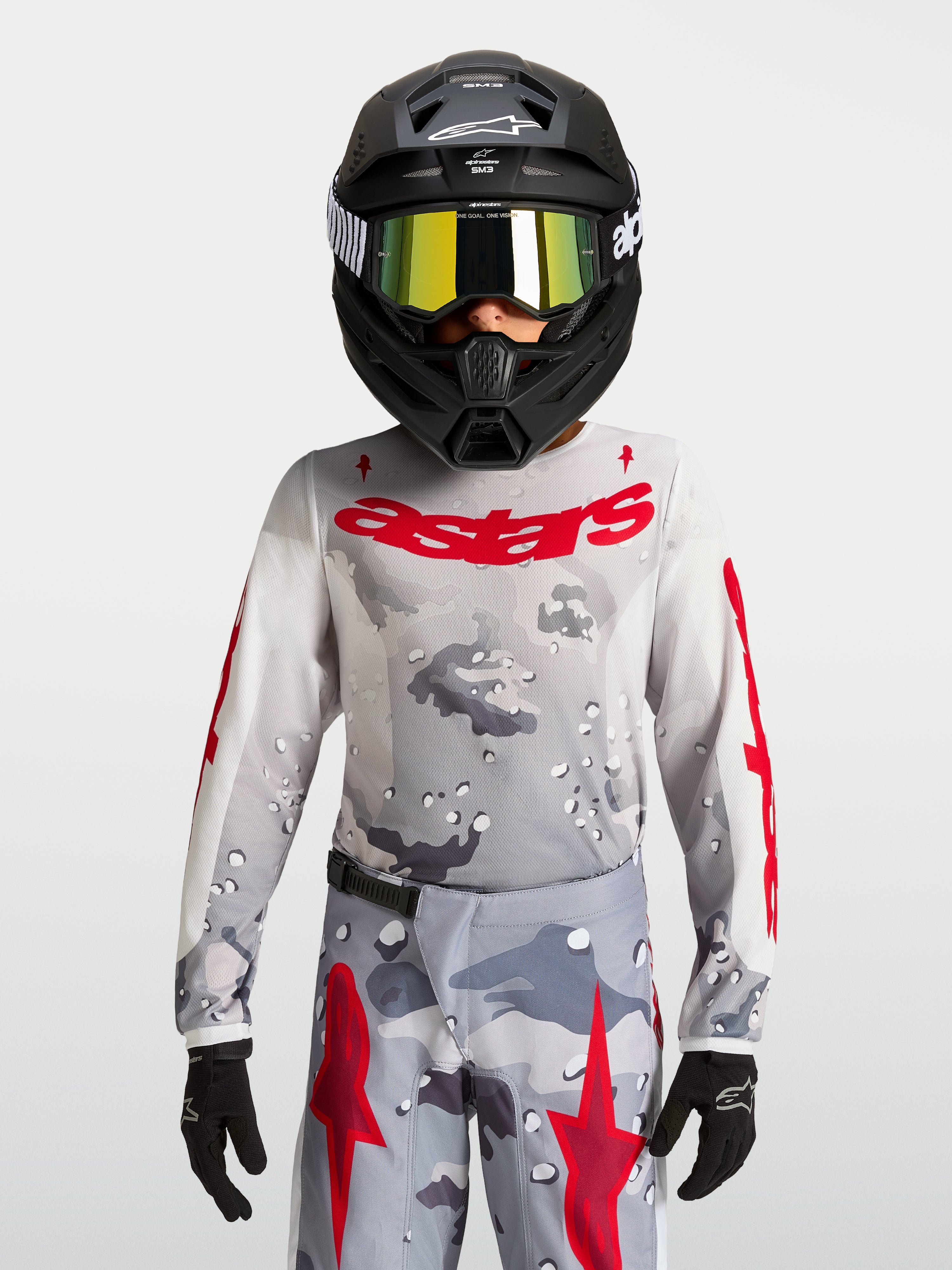 Alpinestars 2027 Youth Fluid Lone Jersey, gray camo and fire red motocross gear, performance textile construction.
