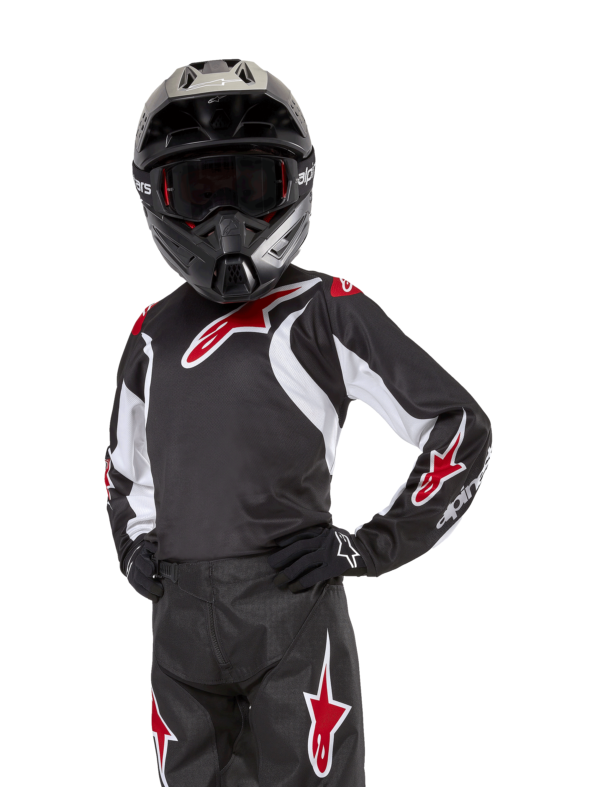 Youth 2024 Racer Lucent Jersey, Motocross Jersey, Black White and Red, worn by a youth rider with a black helmet and matching pants, featuring red star logos and white graphic accents, performance off-road apparel for dirt bike racing