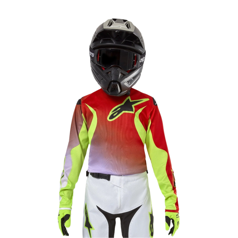 Alpinestars Youth 2024 Racer Lucent Jersey, Motocross Jersey, White Neon Red and Yellow Fluo, featuring a red and neon yellow design with a black star logo, worn with matching black helmet, white pants, and neon gloves for a professional off-road racing kit.